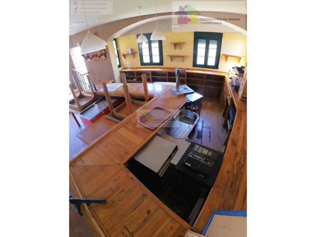 se vende local de negocios, tiene vivienda, ahora se encuentra como local de Hosteleria, pero podria destinarse a cualqu photo 0