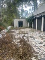 ¡Oportunidad única de inversión en Ayamonte! Parcela con vivienda a reformar en ubicación estratégica photo 0
