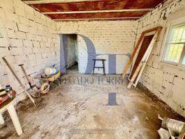 AMPLIO TERRENO CERCANO A VÉLEZ CON ESTRUCTURA DE CASA DE 50m² photo 0