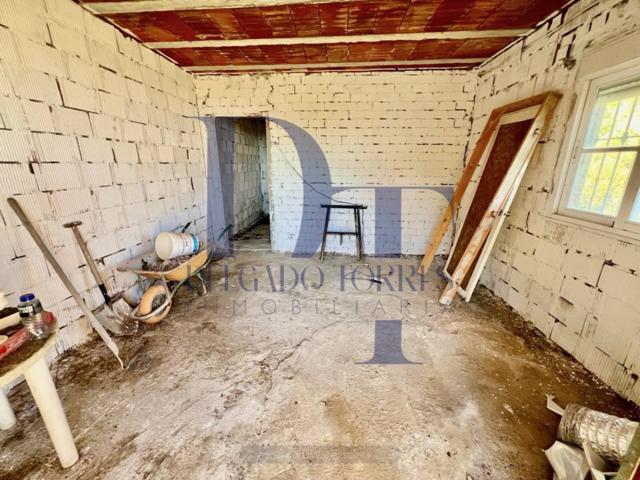 AMPLIO TERRENO CERCANO A VÉLEZ CON ESTRUCTURA DE CASA DE 50m² photo 0