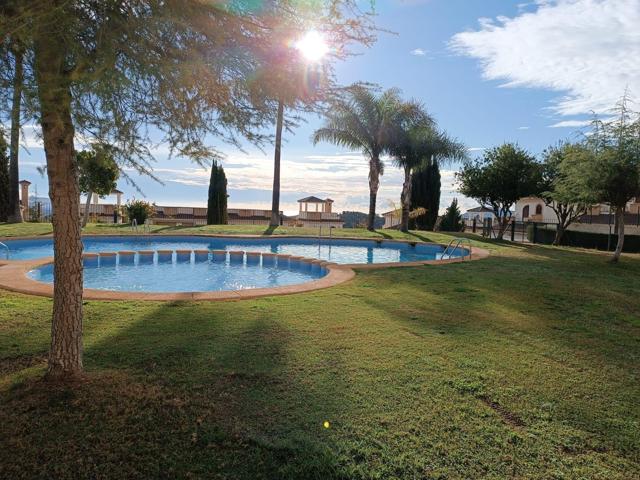 Chalet adosado en venta en Polop con solárium, terraza y piscina comunitaria photo 0