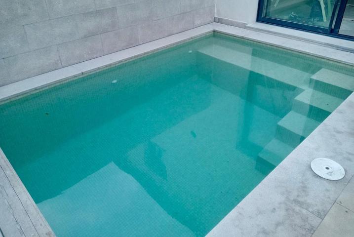 CASA PAREADA CON PISCINA(obra nueva) photo 0