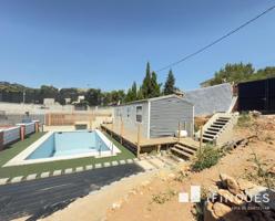 BRUTAL TERRENO CON MUROS, PUERTA Y PISCINA photo 0