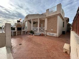 SE VENDE ADOSADO DE 3 DORMITORIOS 2 BAÑOS EN PLAYA FLAMENCA ( ORIHUELA COSTA) photo 0