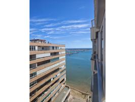 ÁTICO REFORMADO A ESTRENAR CON VISTAS AL MAR – PLAYA DEL ACEQUIÓN (TORREVIEJA) photo 0