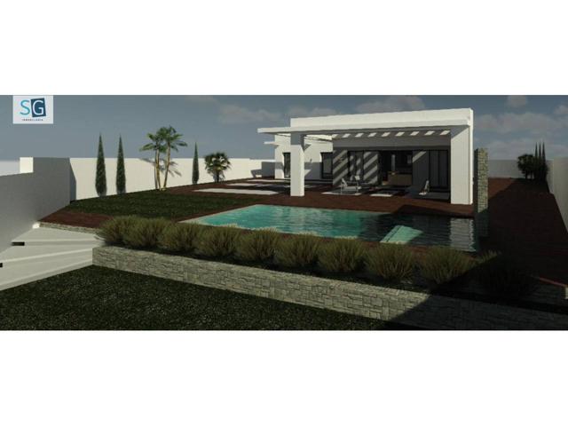 Se vende parcela con un increíble proyecto para una moderna casa de planta baja que redefine el confort y el estilo. photo 0