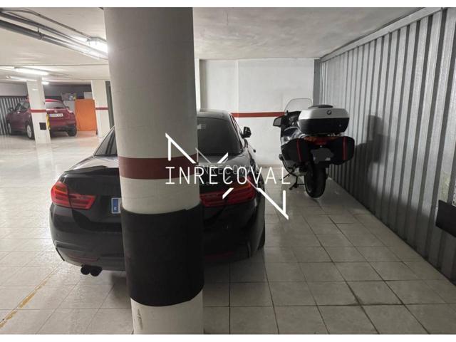 SE VENDE AMPLIA PLAZA DE GARAJE PARA COCHE Y MOTO – EXCLUSIVIDAD Y COMODIDAD photo 0