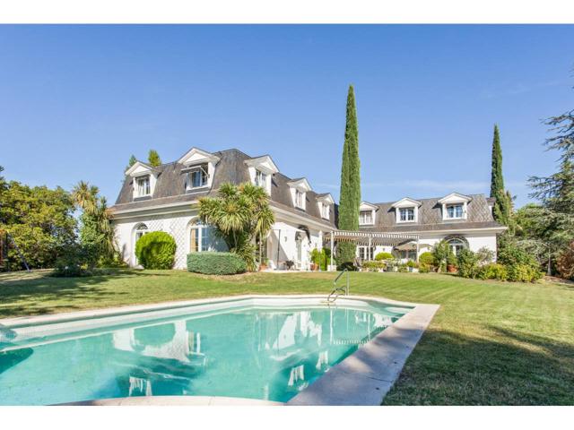 Magnifica casa con excelentes vistas en excelente urbanización. Justo al lado del Club de Golf en situación privilegiada photo 0