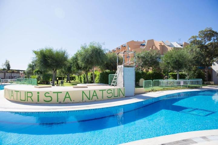 Planta baja en primera línea de playa en urbanización Naturista Natsun photo 0