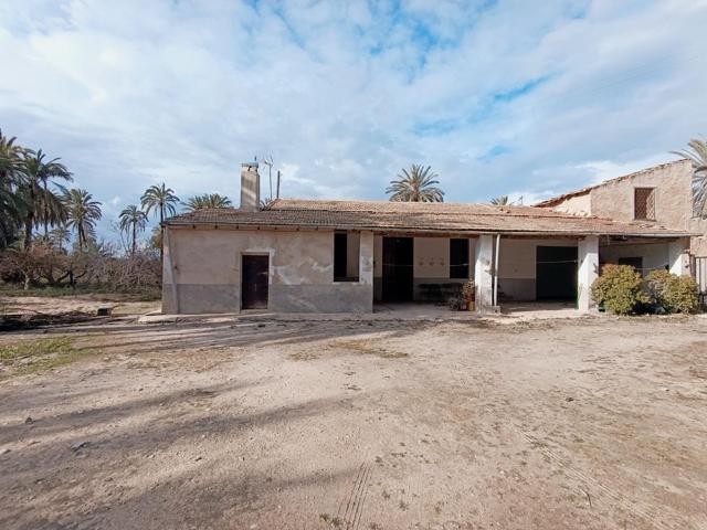 CASA DE CAMPO ADOSADA, CON ÁLJIBE Y TRES PARCELAS PRODUCTIVAS DE GRANADAS photo 0