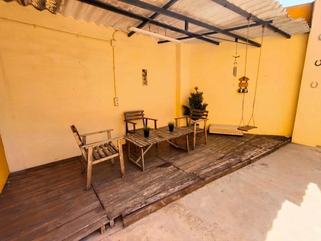 ¡Oportunidad en Benifaió! Casa adosada lista para entrar a vivir, con amplios espacios y gran patio photo 0