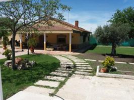 CASA CON PISCINA Y TERRENO EN C.MADRID photo 0