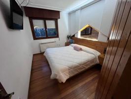 Bajo con jardín en venta en Isla photo 0