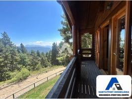 PORT DEL COMTE - CASA de madera photo 0