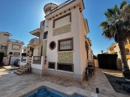 Unifamiliar En venta en Pau 26, Orihuela Costa photo 0