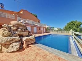 Villa en venta con apartamento independiente en Les Rotes, Denia photo 0