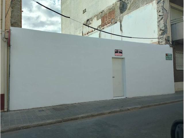 Pequeño solar en el mismo centro en una vía principal. photo 0