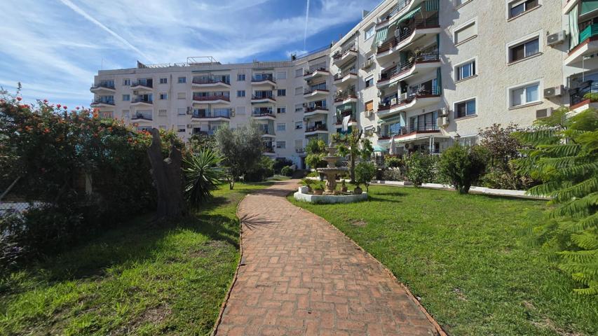 Apartamento en planta baja con piscina y parking comunitario en Playamar, Torremolinos photo 0