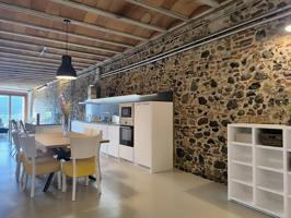 Casa de pueblo en venta en Hostalric, reformada con un estilo rústico y vanguardista photo 0