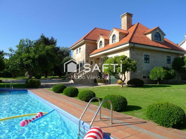 SAFTI vende casa de campo exclusiva de piedra con calidades premium en Teo. Elegancia, espacio y confort en un entorno privilegiado. photo 0