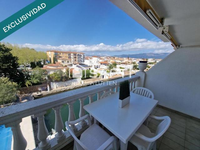 Piso con vistas al canal y piscina en Empuriabrava. photo 0