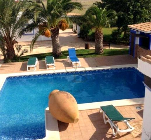 Casa con taller y gran terreno en venta photo 0