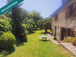 CASA DE PIDRA CON JARDIN photo 0