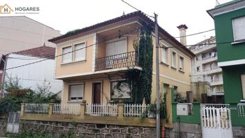 Chalet en Venta en Cangas photo 0