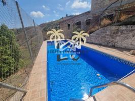 CASA DE PUEBLO INDEPENDIENTE DE 5 DORMITORIOS CON PISCINA PRIVADA, ZONA DE PARKING, PARCELA DE 426 m2 y VISTAS A LA MARO photo 0