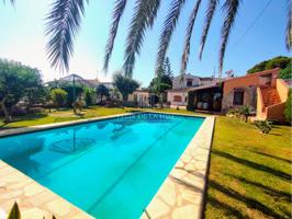 CASA DE ESTILO RUSTICO, CON UNA PISCINA GRANDE Y UN BONITO JARDÍN. photo 0