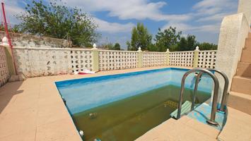 Chalet con piscina y paellero photo 0