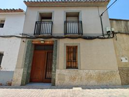 Casa de pueblo con solar urbano photo 0