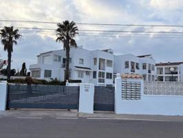 Adosado en urbanización con piscina frente al mar photo 0