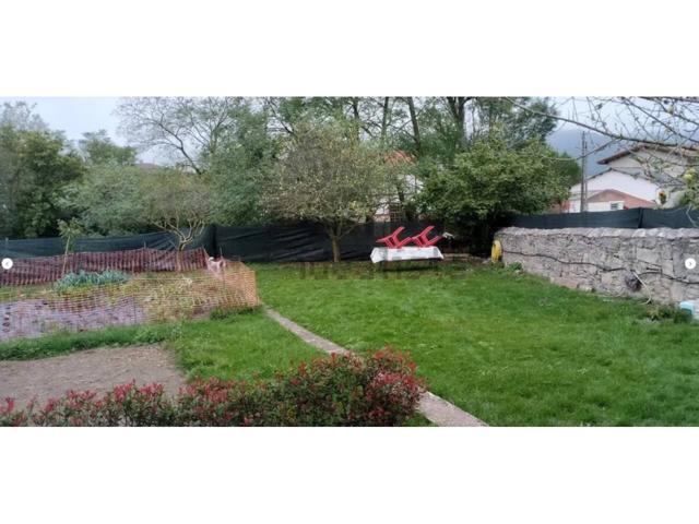 CASA EN VENTA CON TERRENO EN QUINCOCES DE YUSO photo 0