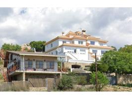 Chalet unifamiliar en venta en Manzanares el Real photo 0