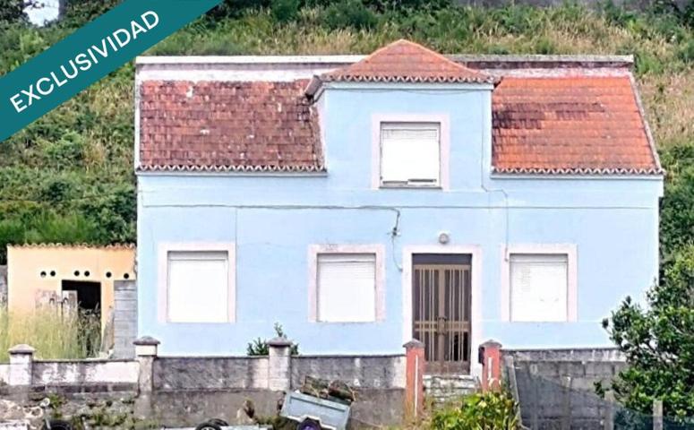 Casa para restaurar con huerta cerca de la playa de As Furnas. photo 0