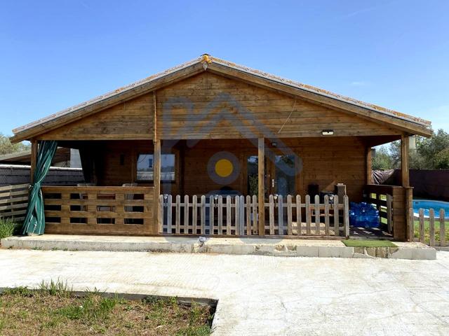 PARCELA CON CASA Y PISCINA photo 0