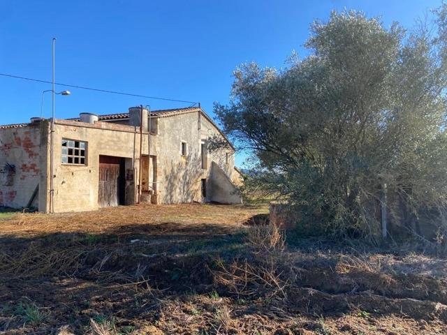 CASA RÚSTICA AMB GRAN TERRENY EN VENTA A CASSÀ DE LA SELVA photo 0