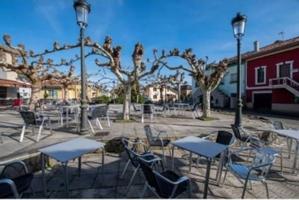 BAJO EN VENTA CON PEQUEÑO TERRENO EN VEGA DE SARIEGO photo 0