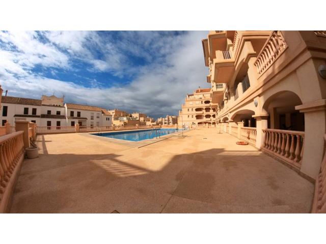 Magnifico bajo de 2 dormitorios con gran terraza y patio interior, en pleno centro de Almerimar. photo 0