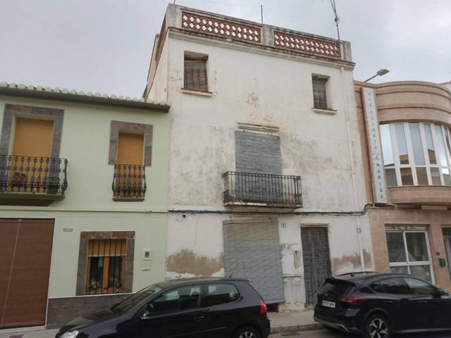 Gran casa de pueblo a reformar en pleno centro de Potries photo 0