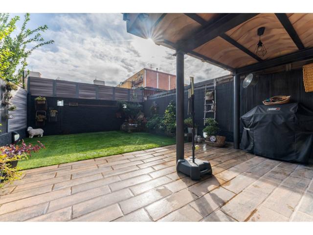 Encantadora casa adosada reformada con jardín y garaje para 2 coches en La Llagosta photo 0