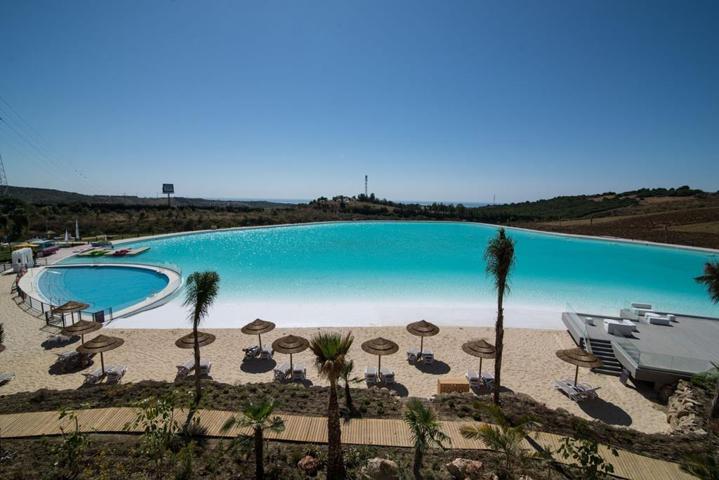 EXTRAORDINARIAS VIVIENDAS DE LUJO JUNTO A PLAYA ARTIFICIAL Y CAMPO GOLF photo 0