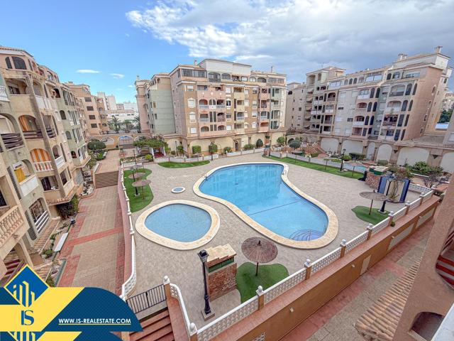 Amplio apartamento con excelente distribución de espacios y bellísima piscina comunitaria + Garaje incluido en el precio photo 0