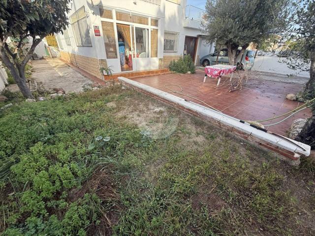 Bonita planta baja con gran jardín privado photo 0