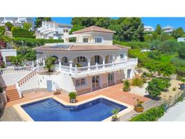 Villa En venta en Moraira photo 0
