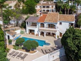 Villa En venta en Moraira photo 0