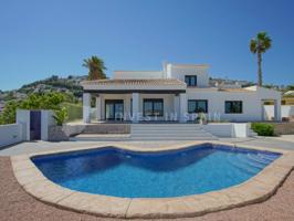 Villa En venta en Moraira photo 0