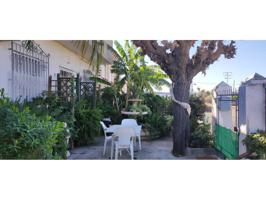 CASA EN PLANTA BAJA CON PATIO Y NEGOCIO DE PLANTAS. photo 0