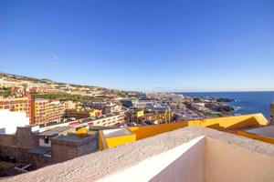 Dos apartamentos en planta baja con impresionantes vistas al mar en venta en Puerto Santiago photo 0